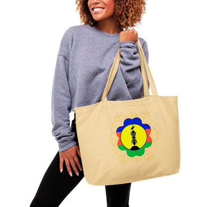 Grand tote bag bio  aux teintes emblématiques de la culture kanak.